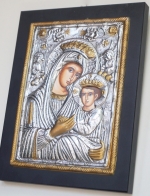 Icon with metal casings