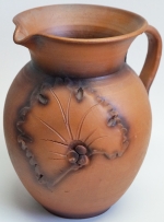 Ceramic pot with hole and plate