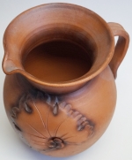 Ceramic pot with hole and plate
