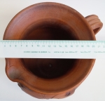 Ceramic pot with hole and plate