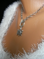 Medallion turtle metal