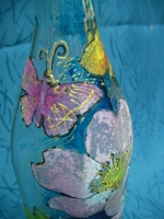 Painted bottle in Decoupage