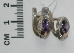 Silver earrings with gold applique