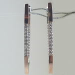 Unique handmade silver earrings with gold applique fianite