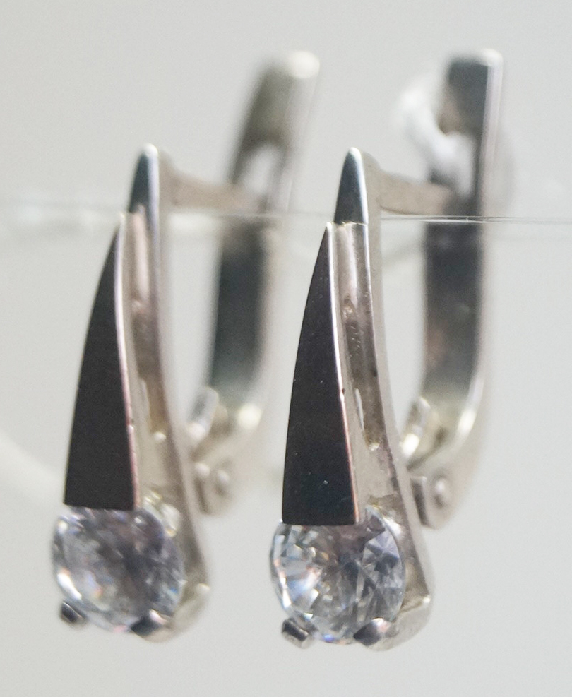 Unique handmade silver earrings with gold applique zircon
