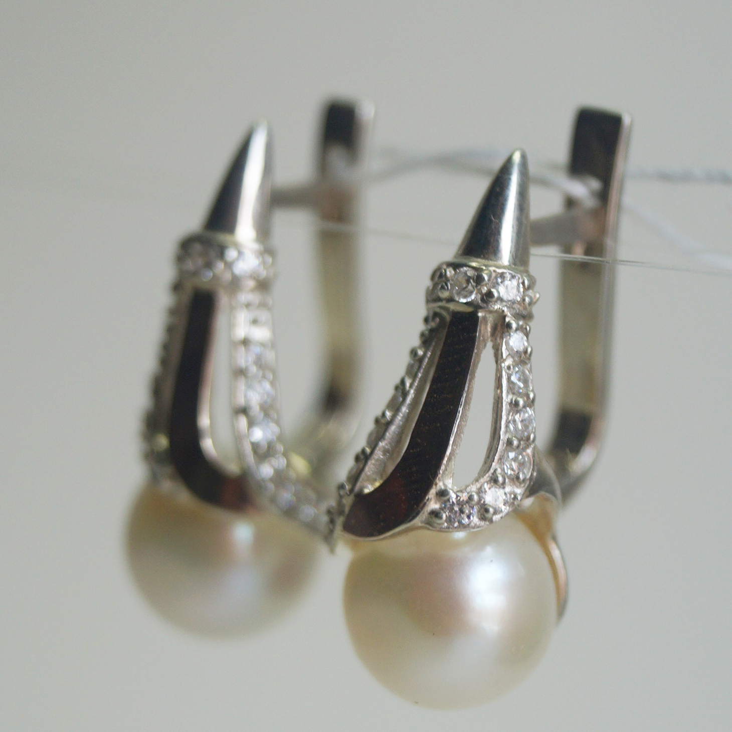 Unique handmade silver earrings with gold applique pearl fianite